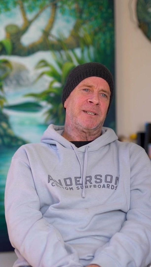 A surf artist, in his studio